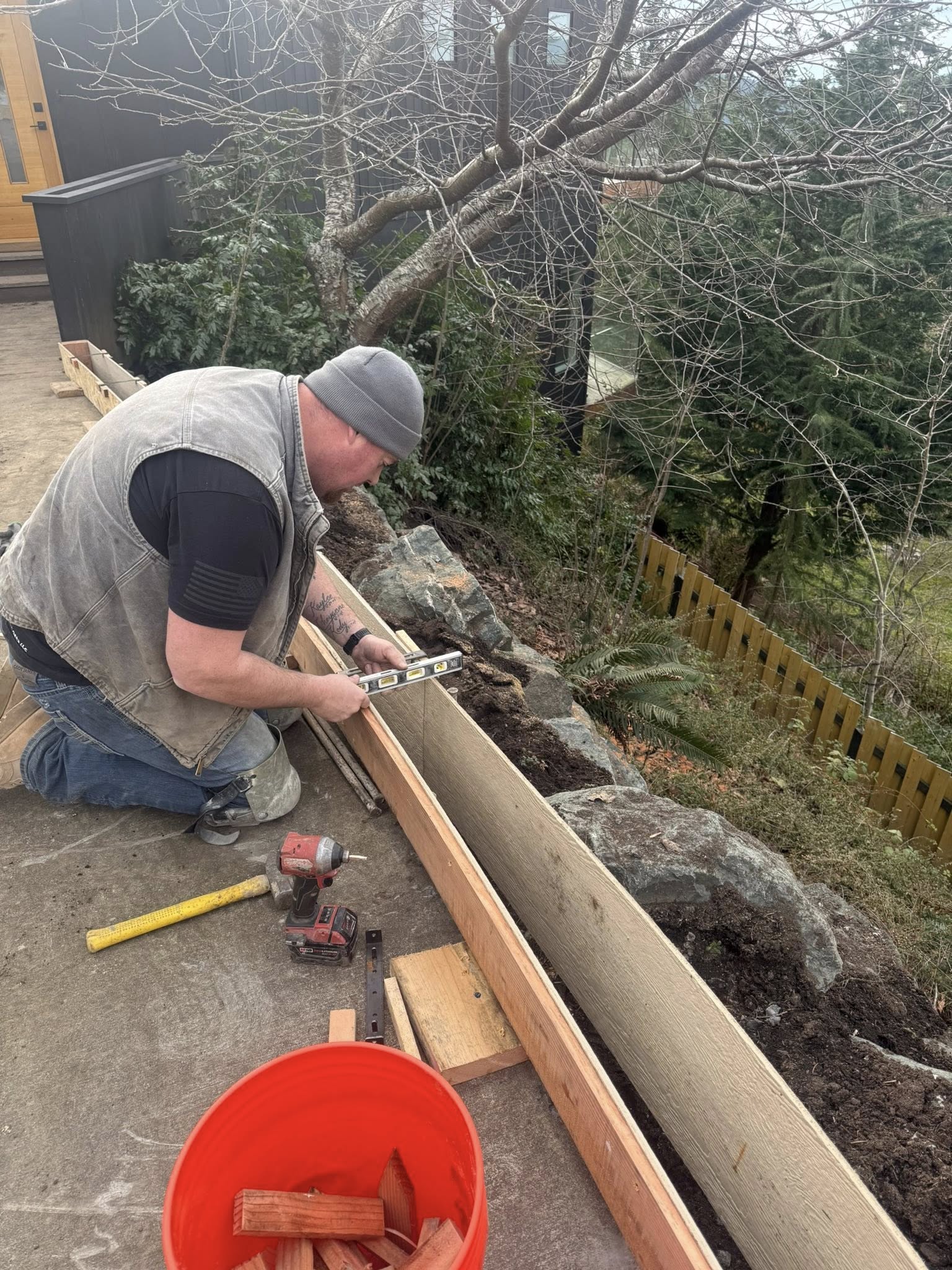 Adam Moa working on site